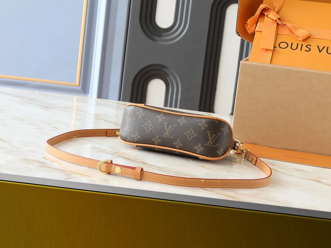 💰200💰Upgraded original M25519 presbyopic mini croissant bag NANO BOULOGNE croissant handbag The Boulogne handbag is made of classic Monogram canvas, equipped with double zippers and a spacious inner patch pocket that can accommodate an iPhone 12 Pro mobile phone. The adjustable shoulder strap allows it to be worn cross-body or over the shoulder, and can be removed to transform into a small chain bag or clutch. Dimensions: 20 x 14 x 6 cm