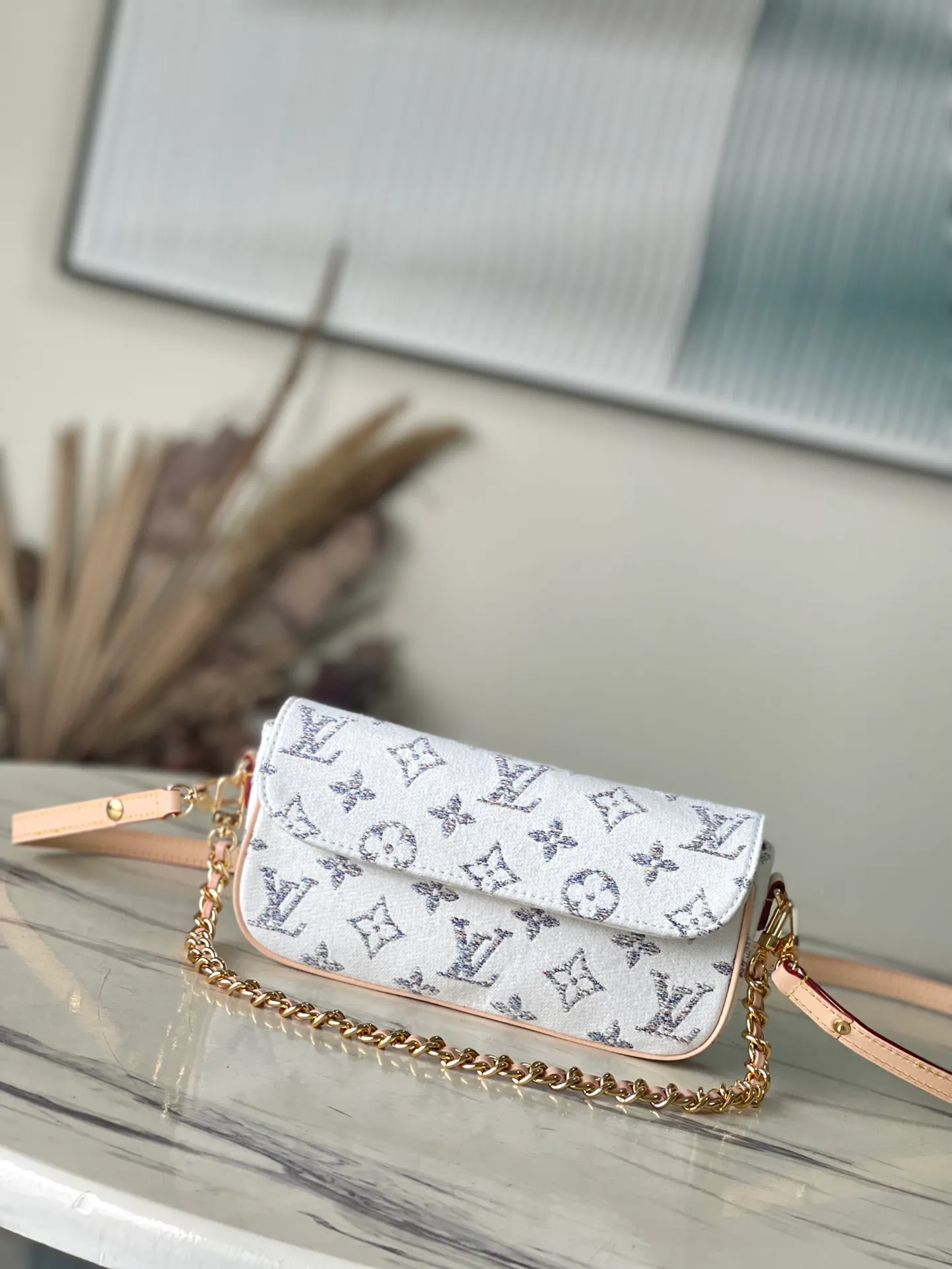 💰900 Top Original Order M83499 This Wallet on Chain Ivy handbag opens with a magnetic flap and has a rounded rectangular body, presenting a modern interpretation of a mini handbag. Monogram jacquard fabric traces the texture of tweed and is offset by leather trim. The adjustable leather shoulder strap and lace-up chain are both removable, allowing for a variety of styling possibilities. Dimensions: 23.5 x 12 x 4.3 cm (length x height x width)