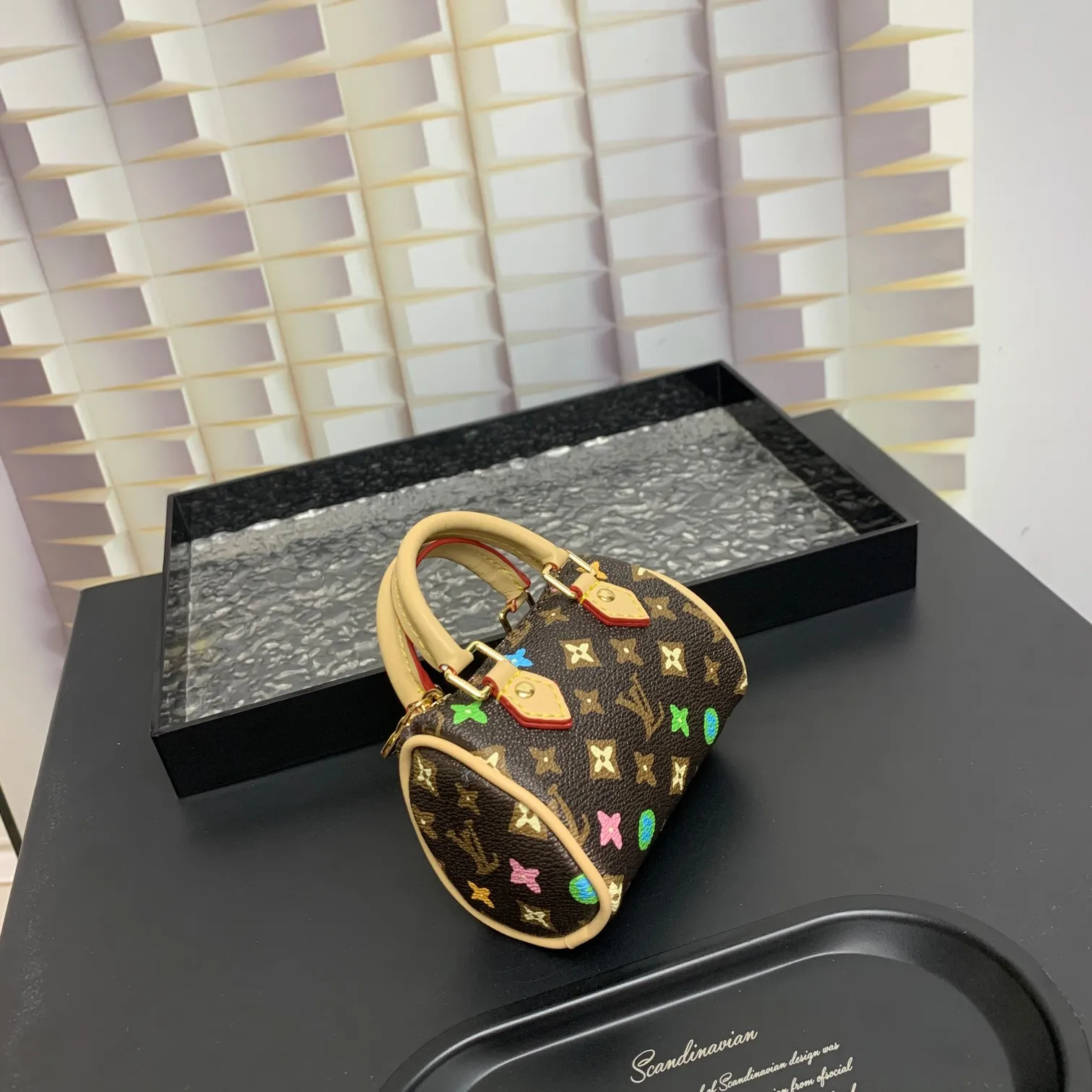 💰200 shipped😍 MINI KEEPALL bag charm and keychain ☀️Louis Vuitton Louis Vuitton lv mini pillow bag pendant ☀️This Mini Keepall bag charm and keychain condenses the classic handbag configuration, boldly showing the spirit of adventure. Monogram canvas with LV inscribed hook buckle, whether hung on a belt or handbag, its zipper closure and built-in keychain ensure secure storage