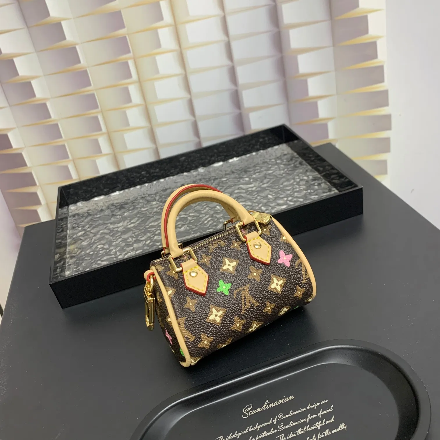 💰200 shipped😍 MINI KEEPALL bag charm and keychain ☀️Louis Vuitton Louis Vuitton lv mini pillow bag pendant ☀️This Mini Keepall bag charm and keychain condenses the classic handbag configuration, boldly showing the spirit of adventure. Monogram canvas with LV inscribed hook buckle, whether hung on a belt or handbag, its zipper closure and built-in keychain ensure secure storage