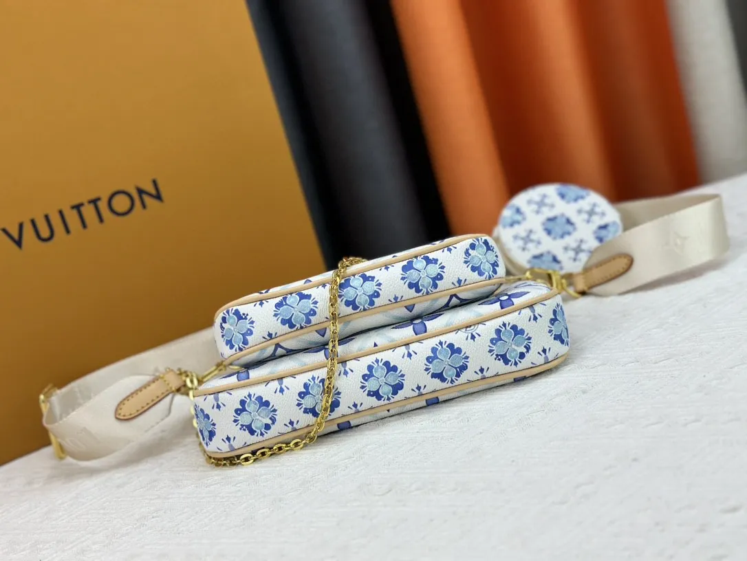 P260 Upgraded version M44823 M25374 Blue Five-in-one Mahjong bag series The new season MULTI POCHETTE ACCESSOIRES Xph handbag This Multi Pochette Accessoires handbag comes from the LV By The Pool series, using Monogram Tiles canvas to release the summer atmosphere, and then the zipper bags are nestled together. Explore more styling and carrying possibilities with the detachable and adjustable wide fabric shoulder strap and dazzling chain. Dimensions: 24 x 13.5x4 cm