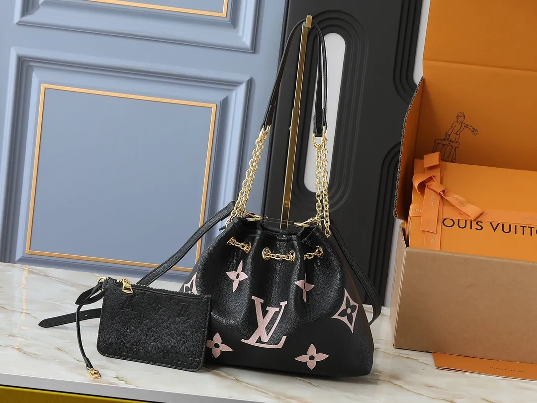 💰260💰Upgraded original version ✨M11283 M25453 M47209 M46545 M46492 This Summer Bundle handbag is from the Dégradé series. The new drawstring design adds a summer atmosphere. The Monogram Empreinte embossed leather bag features a gradient tone to brighten any seasonal look. The double handles and detachable cross-body strap provide a variety of stylish carrying options, making it a great companion for travel day and night. Detailed features: 28 x 20 x 11.5 (Length x Height x Width)