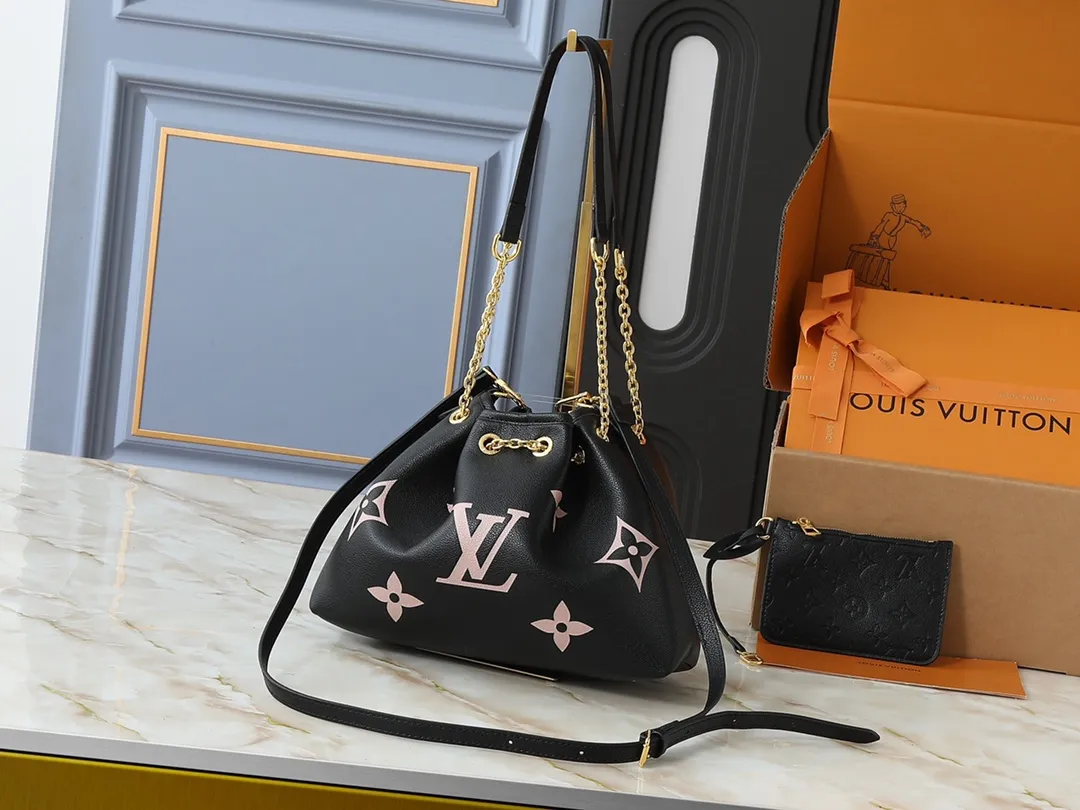 💰260💰Upgraded original version ✨M11283 M25453 M47209 M46545 M46492 This Summer Bundle handbag is from the Dégradé series. The new drawstring design adds a summer atmosphere. The Monogram Empreinte embossed leather bag features a gradient tone to brighten any seasonal look. The double handles and detachable cross-body strap provide a variety of stylish carrying options, making it a great companion for travel day and night. Detailed features: 28 x 20 x 11.5 (Length x Height x Width)