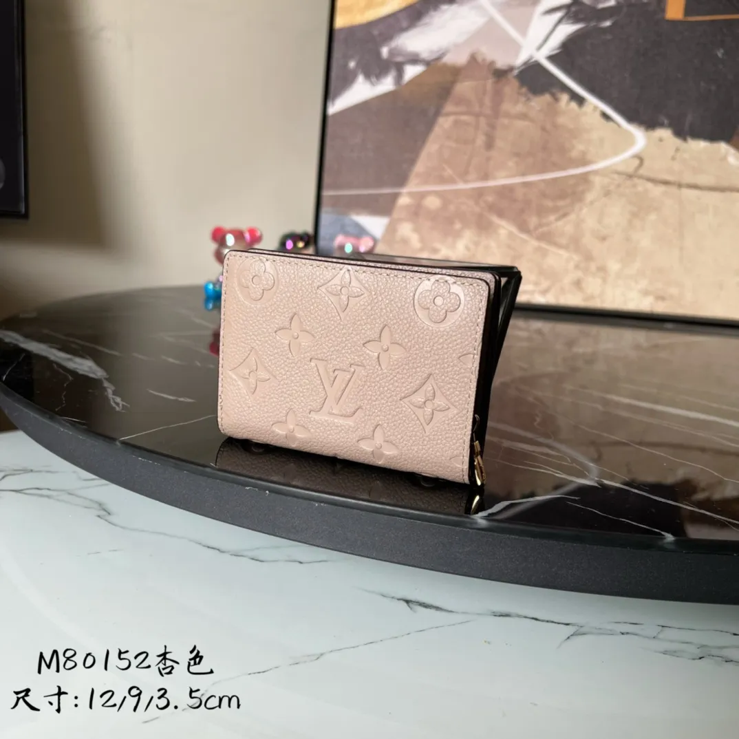 Factory price 480 Top original order M80152 Apricot This Cléa wallet is made of Monogram Empreinte soft grained cowhide, embellished with Louis Vuitton's iconic Monogram embossed pattern. It has a stylish design, is exquisite and compact but has a spacious capacity. It is equipped with an external patch pocket, zipper coin pocket, banknote compartment and six credit card slots. Details 12 x 9 x 3.5 cm (Length x Height x Width) Turtledove beige Soft grained embossed cowhide Leather lining Gold-tone hardware Snap-button closure Compartment for notes Accordion zip coin pocket External patch pocket Inner card compartment 6 credit card slots