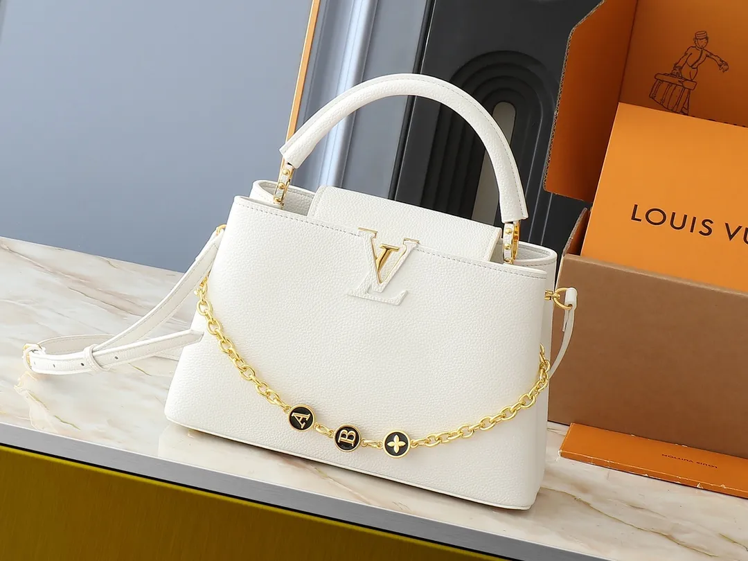 💰420💰Guangzhou goods Upgraded original M00014 M00013 M00015 [New size] This Capucines new size handbag shows soft beauty: Taurillon leather body with light-colored flap and top handle, enamel Monogram flower chain can also achieve a shoulder-carrying experience. Wear the slim leather strap to explore more styling possibilities. Dimensions 31.5 x 20 x 11 cm (length x height x width)