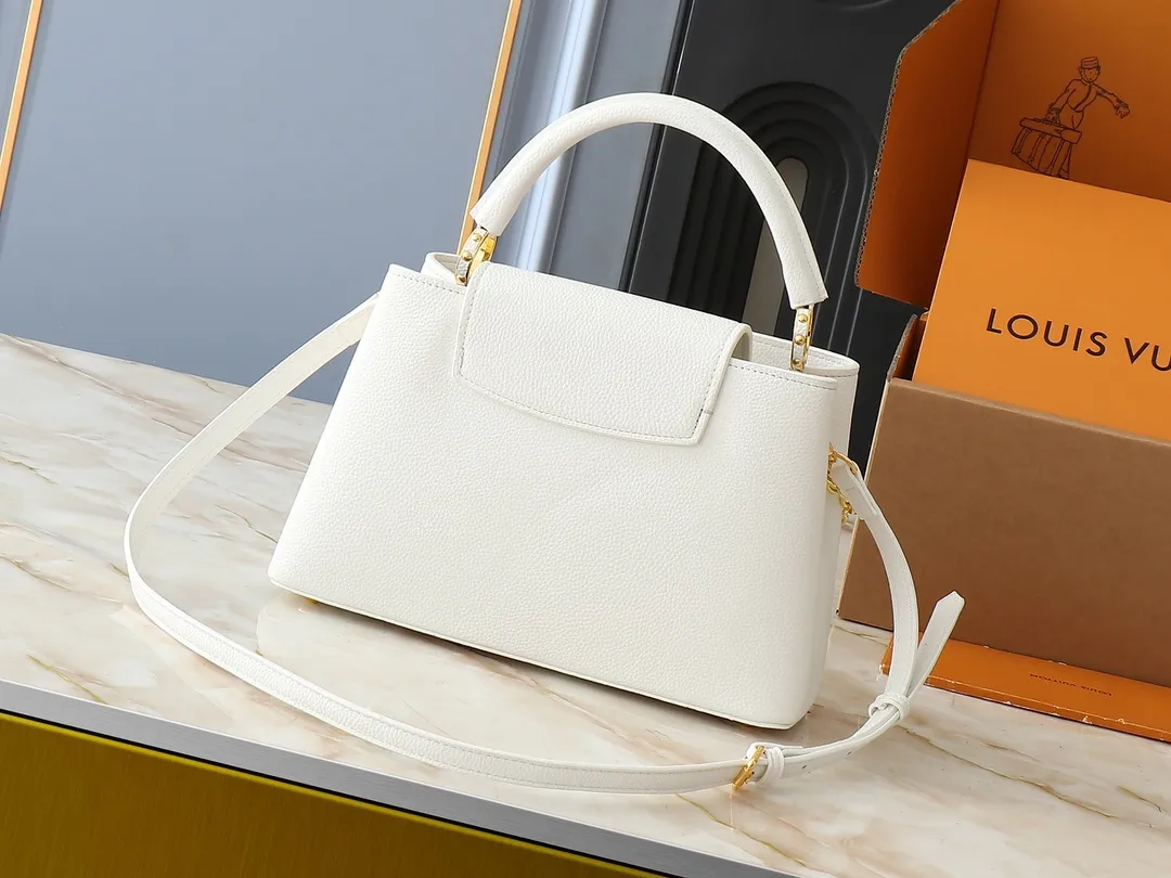 💰420💰Guangzhou goods Upgraded original M00014 M00013 M00015 [New size] This Capucines new size handbag shows soft beauty: Taurillon leather body with light-colored flap and top handle, enamel Monogram flower chain can also achieve a shoulder-carrying experience. Wear the slim leather strap to explore more styling possibilities. Dimensions 31.5 x 20 x 11 cm (length x height x width)