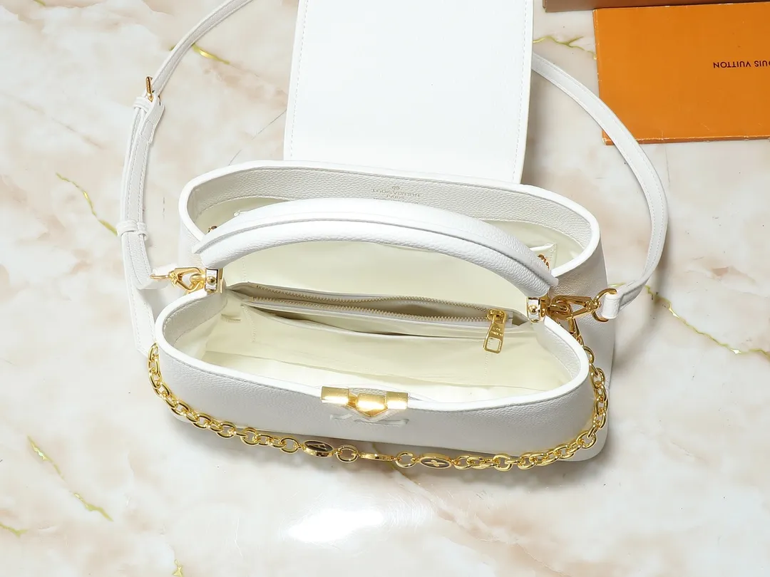💰420💰Guangzhou goods Upgraded original M00014 M00013 M00015 [New size] This Capucines new size handbag shows soft beauty: Taurillon leather body with light-colored flap and top handle, enamel Monogram flower chain can also achieve a shoulder-carrying experience. Wear the slim leather strap to explore more styling possibilities. Dimensions 31.5 x 20 x 11 cm (length x height x width)