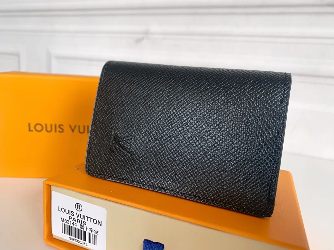 💰80 💎Small card holder Louis vuitton's pocket leather wallet has seven compartments, which can hold credit cards, bus cards, business cards, and even city maps. Damier canvas, leather-bound - two credit card compartments - four inner compartments - one outer compartment. ❤️ Model M63144 Size 7X11.