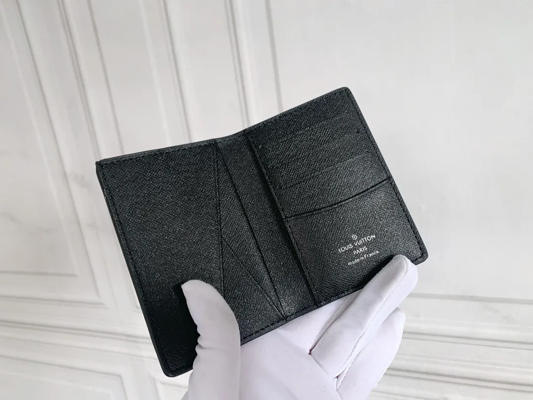 💰80 💎Small card holder Louis vuitton's pocket leather wallet has seven compartments, which can hold credit cards, bus cards, business cards, and even city maps. Damier canvas, leather-bound - two credit card compartments - four inner compartments - one outer compartment. ❤️ Model M63144 Size 7X11.