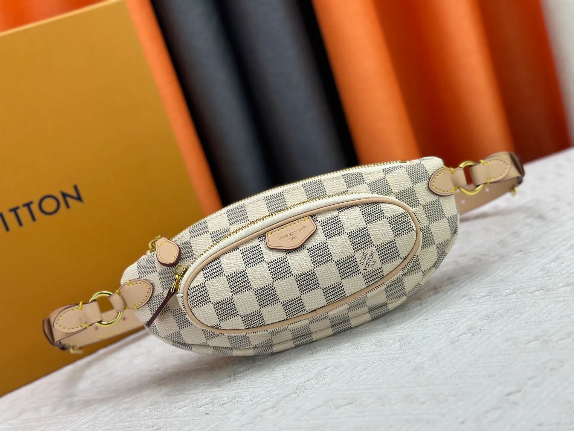 P220 upgraded original M14806 M00230 combines classic elements with new styles - checkerboard elements appear on dish-shaped waist bags and small square hand bags, which are both recognizable and fresh. Size 28-13-3