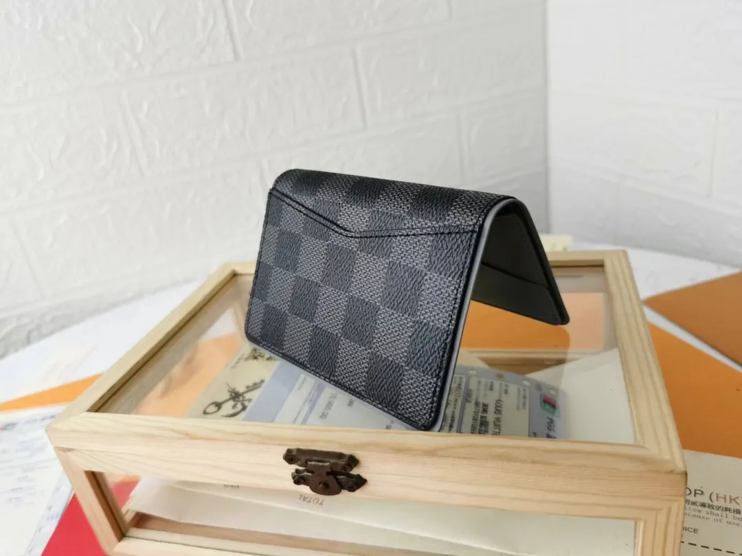 P110💰Top Original💎N63144 black check with yellow, this pocket wallet combines the elegance of Damier Graphite canvas with the delicate texture of Epi leather, with stripes emblazoned with the Louis Vuitton logo. The elegant design can accommodate credit cards, banknotes and receipts, making it suitable for daily carrying or gift giving. Detailed Features 8.0 x 11.0 x 1.0 cm (L x H x W) Epi leather and Damier Graphite coated canvas Coated cowhide leather trim Cowhide lining, card compartment, inner pocket, outer patch pocket This product is made in one of France, Spain, Italy and the United States
