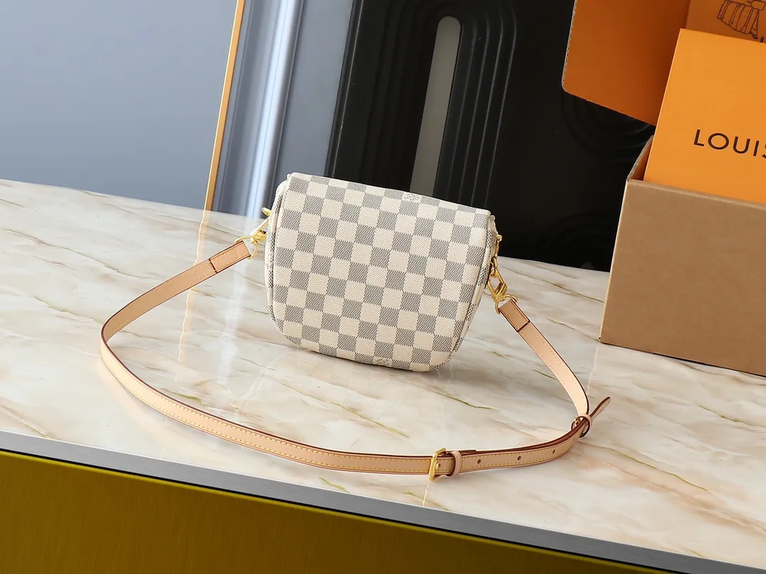 💰220💰Upgraded from the original M46917 M82335 M83275 M82208 M82347 This Mini Bumbag handbag comes from the LV Gradient series and uses the Monogram embossing of Monogram Empreinte leather to render gradient midsummer colors. The on-trend construction features a zipped main compartment and a front pocket with a Louis Vuitton leather label. With the detachable chain and detachable and adjustable shoulder strap, it can be worn as a shoulder or cross-body bag. 17.0 x 12.0 x 9.5 cm (L x H x W) • Monogram Empreinte embossed soft-grained cowhide leather • Textile lining • Metal hardware • Zip closure • Zip front pocket • Shoulder strap: removable, adjustable • Half-length strap: 32.0 cm • Half-length strap adjustable to: 44.0 cm • Chain: Removable • Half-length chain: 20.0 cm