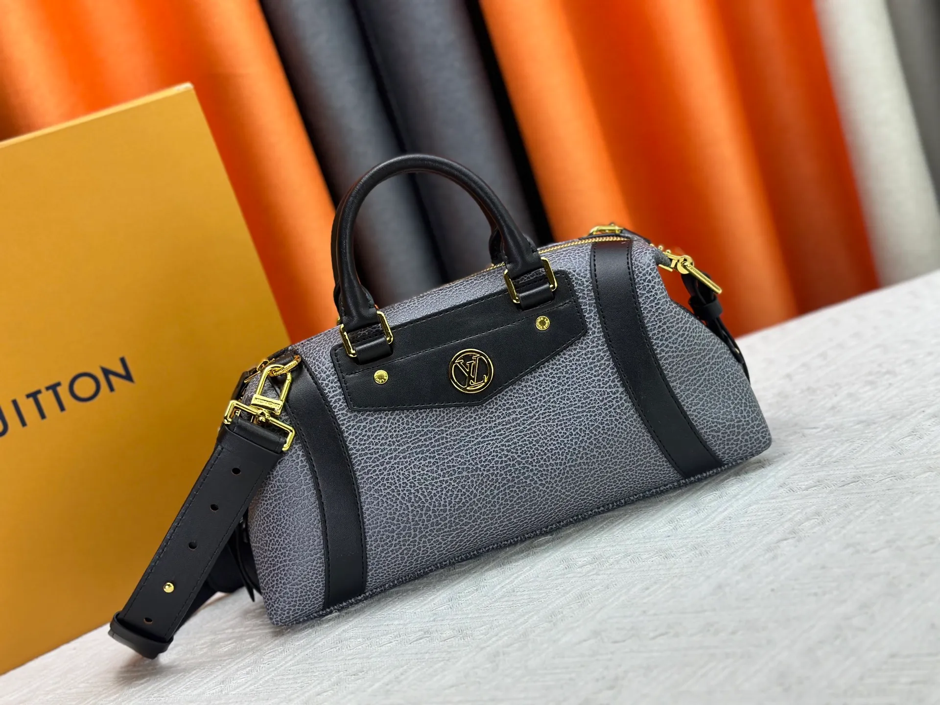P300 small P320 medium P340 large M25557 M25561 M25561 M25566 Black M14623 mini M14514 small M14700 medium Dark gray M14702 medium Light gray M14721 small This Nano LV Rider handbag is from 2025 For the spring and summer series, pixelated grained sheep leather is blended with smooth cow leather elements, and the LV Circle logo is highlighted with elegant patches. The foldable configuration makes it easy to store in a suitcase, and the modern design adds a rock-n-roll edge to any look.  Mini 10 x 10 x 23 cm Small 12 × 12 × 30 cm Medium 15 × 15 × 38 cm (H x W x L) Sheep leather Cow leather trim Textile lining Metal hardware Zipper closure Side slip straps Internal pocket Holds a 6.7-inch smartphone, Romy card holder and lipstick Shoulder strap: removable, adjustable Strap half-length: 30.0 cm Bag strap half length adjustable to: 45.0 cm Handle: double handle