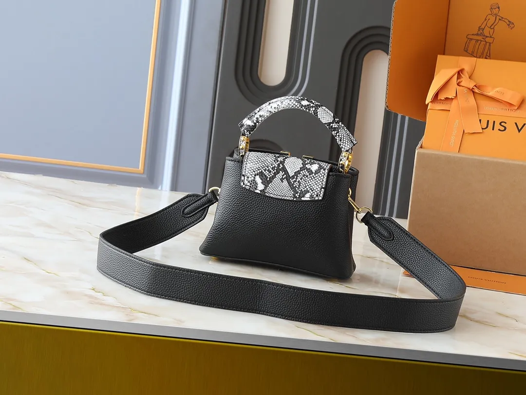 💰320💰Guangzhou goods Upgraded original M80071 M80041 M81410 M81258 M98477 This Capucines mini handbag displays the subtle sheen of the delicate Taurillon leather and python leather handles, embellished with iconic letters. The detachable wide shoulder strap allows the compact size to be worn on the shoulder or cross-body. Dimensions: 21.0 x 14.0 x 8.0 cm