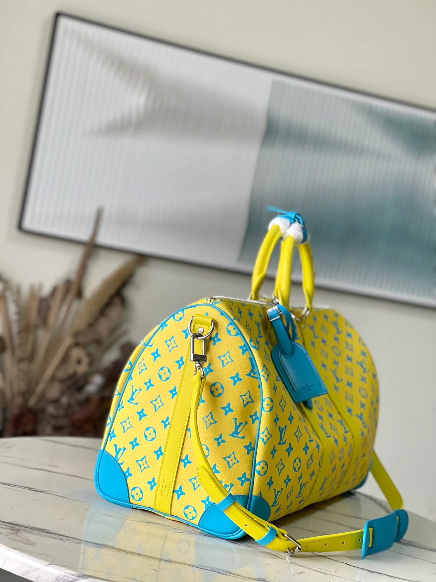 💰1560 (top layer leather) top original order M21869 This Keepall Bandouliore50 travel bag is made of Monogram Playground canvas, with a Monogram pattern that resembles clay sculptures carved in bright colors. Reinforced corners, name tags, and key cases are all made of leather, contrasting with the colors of Monogram flowers and letters. Dimensions: 50 × 29 × 23 am