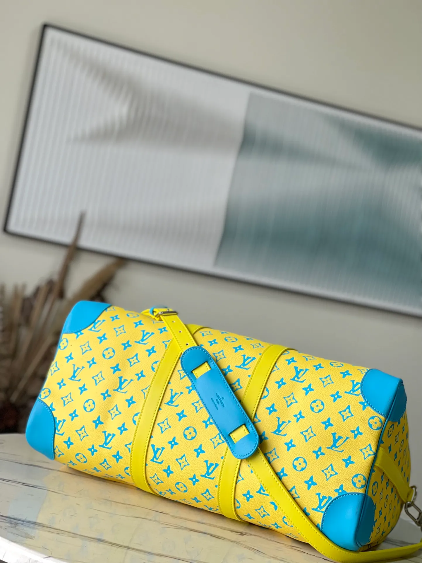 💰1560 (top layer leather) top original order M21869 This Keepall Bandouliore50 travel bag is made of Monogram Playground canvas, with a Monogram pattern that resembles clay sculptures carved in bright colors. Reinforced corners, name tags, and key cases are all made of leather, contrasting with the colors of Monogram flowers and letters. Dimensions: 50 × 29 × 23 am