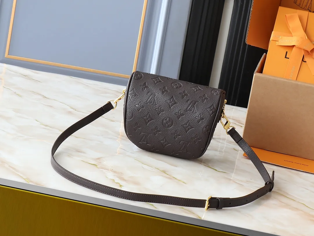 💰200💰Upgraded from the original M46917 M82335 M83275 M82208 M82347 This Mini Bumbag handbag comes from the LV Gradient series and uses the Monogram embossing of Monogram Empreinte leather to render gradient midsummer colors. The on-trend construction features a zipped main compartment and a front pocket with a Louis Vuitton leather label. With the detachable chain and detachable and adjustable shoulder strap, it can be worn as a shoulder or cross-body bag. 17.0 x 12.0 x 9.5 cm (L x H x W) • Monogram Empreinte embossed soft-grained cowhide leather • Textile lining • Metal hardware • Zip closure • Zip front pocket • Shoulder strap: removable, adjustable • Half-length strap: 32.0 cm • Half-length strap adjustable to: 44.0 cm • Chain: Removable • Half-length chain: 20.0 cm