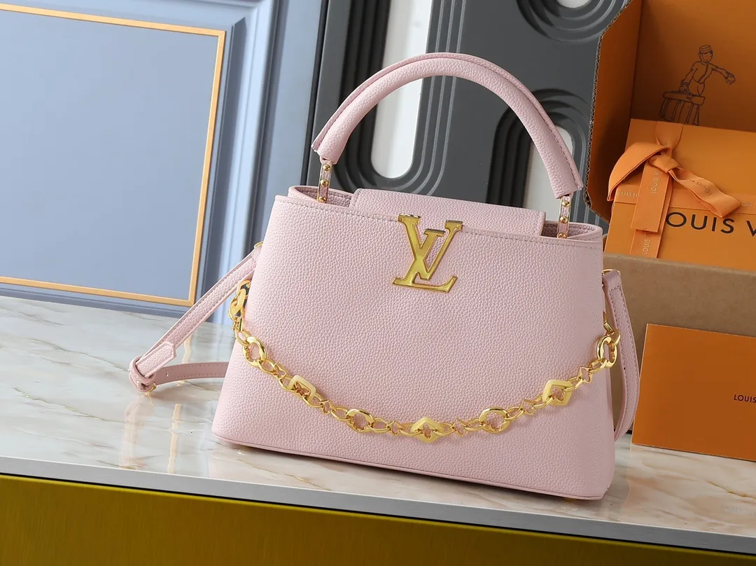 💰460💰Guangzhou goods Upgraded from the original M14381 M14970 M14393 M14972 M14971 This medium Capucines handbag comes from the Harmony series and explores the inspiration of the Monogram flower with a decorative chain. Taurillon cow leather creates an elegant structure, colorful resin outlines the LV letters, and the flip cover provides two styles: external or internal. The neat interior is equipped with multiple pockets, and the detachable and adjustable shoulder strap makes it easy to wear cross-body. Dimensions: 31.5 x 20.0 x 11.0 cm (length x height x width)