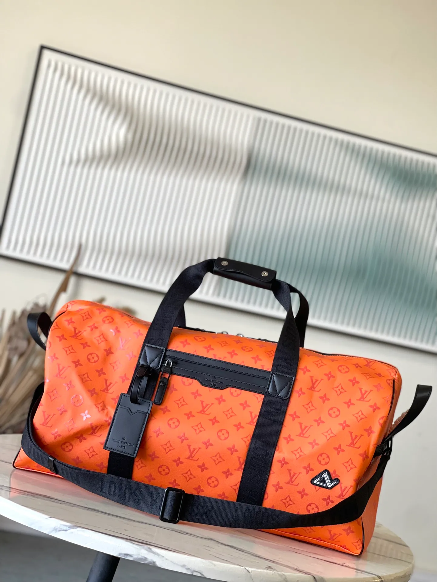 💰1480 Top Original Order M12724 This Keepall Sport travel bag is made of Monogram Storm coated canvas dip-dyed in eye-catching colors, with detachable shoulder straps and side straps to strengthen the structure, highlighting the dynamic style while achieving a comfortable carrying experience. Waterproof zippers keep items wet, and it's complemented by a fabric lining and zipped interior pocket. Dimensions: 55 × 31 × 25 cm