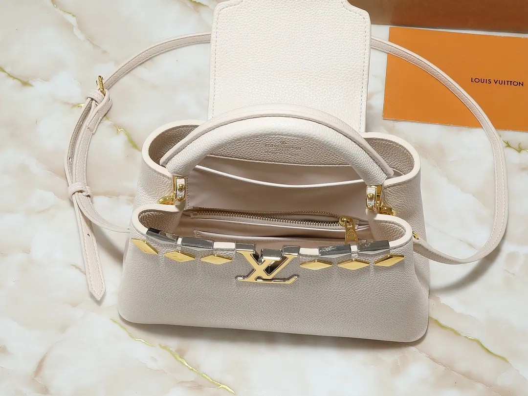💰400💰Guangzhou goods Upgraded from the original M12135 M11964 M12751 This Capucines BB handbag is made of Taurillon cow leather, decorated with mixed metal rhombus Malletage elements on the upper edge, showing a gorgeous interpretation of the classic design. The flap allows for an external or internal style, the neat interior features multiple pockets, and the adjustable shoulder strap adds a cross-body option to the top handle. 27.0 x 17.3 x 9.0 cm (length x height x width)