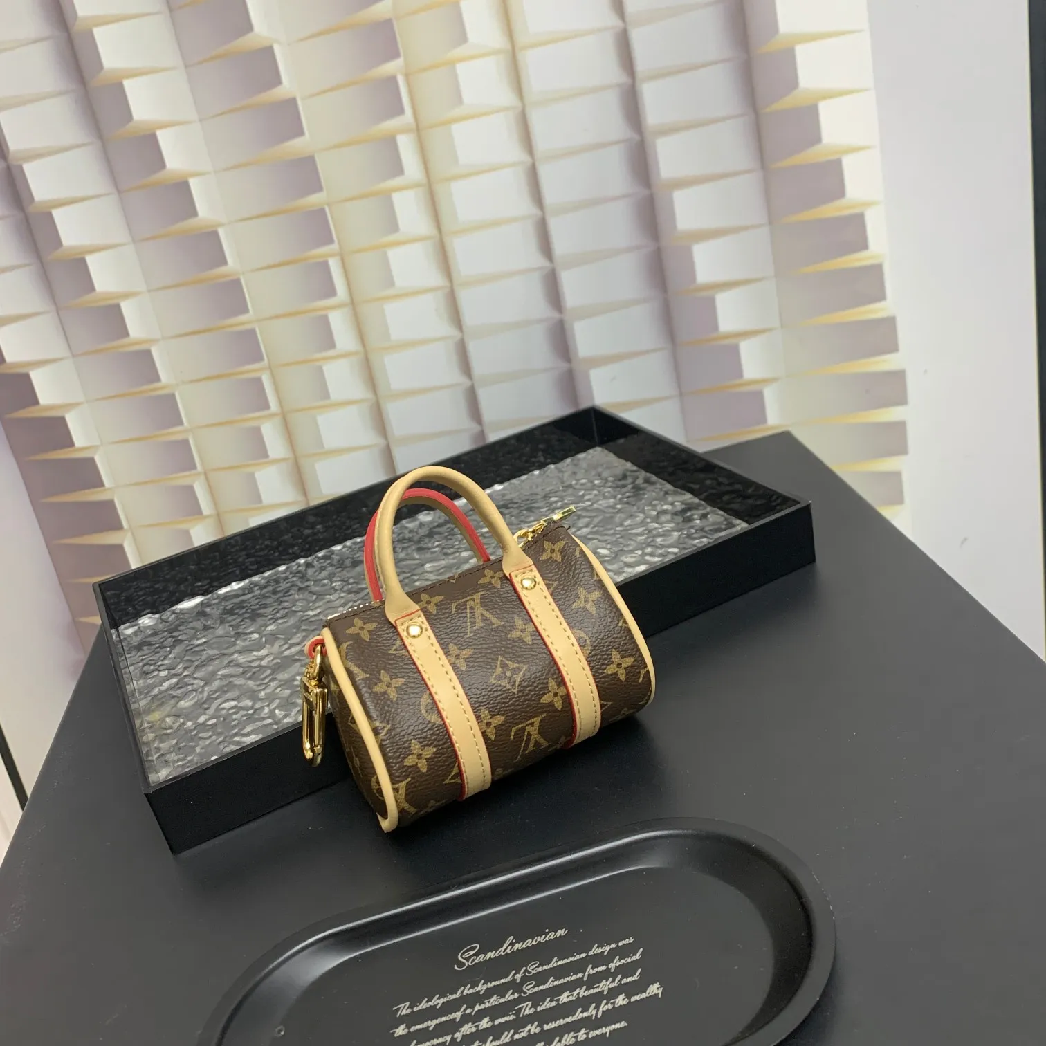 💰200 shipped😍 MINI KEEPALL bag charm and keychain ☀️Louis Vuitton Louis Vuitton lv mini pillow bag pendant ☀️This Mini Keepall bag charm and keychain condenses the classic handbag configuration, boldly showing the spirit of adventure. Monogram canvas with LV inscribed hook buckle, whether hung on a belt or handbag, its zipper closure and built-in keychain ensure secure storage