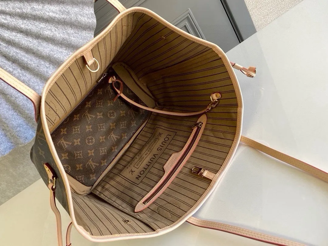 💰760 (medium steel nails) top original order M40995 NEVERFULL medium handbag Neverfull classic handbag, explore the exquisite details inside the bag. The redesigned interior pockets feature a fresh fabric lining, especially the detachable zippered clutch, which can be used alone as a sophisticated clutch or as an additional pocket. Bright lining tones add a more lively feel to Monogram's classic canvas. Detailed features 31 x 28 x 14 cm (Length x Height x Width) Redesigned interior pocket with details inspired by the Louis Vuitton archives Pocket lined with linen fabric Removable zipped clutch with tonal interior pocket Natural cowhide leather trim Shiny gold-tone hardware Handles: Double handle