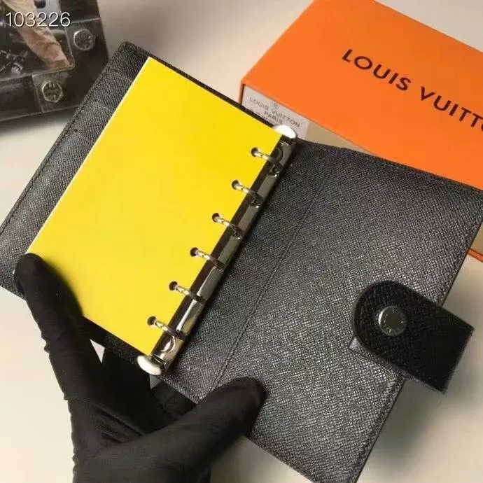 P140 Hot item shipped, model number M20005. This small notepad cover is made of Monogram canvas. It can hold three credit cards and can also be used as an address book, notebook or calendar. 10/12 cm (Length x Height) - Epi leather embossed with delicate LV initials and lined with interwoven textured leather - Button closure - Six-ring binder with three rings in sets, six credit card slots and two internal compartments - Notepad insert available separately