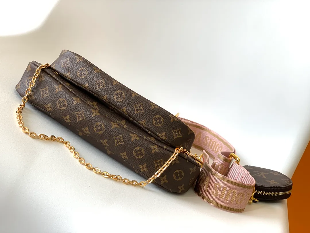 Factory price 460 transcoding chip [Top original order] [M44813 green/M44840 pink/M44823. Multi Pochette Accessories handbags are made of Monogram canvas to form a dynamic three-piece design, and are equipped with multiple pockets and compartments. Adjustable gold-tone chain and Louis Vuitton monogram jacquard shoulder strap for cross-body wear Monogram coated canvas Natural cowhide leather trim Textile lining Gold-tone hardware Adjustable shoulder strap for shoulder or cross-body wear Detachable chain shoulder strap with D-ring 24.0 x 16.0 x 6.0 cm (L x H x W)
