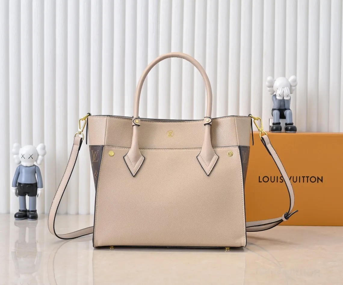 💰360💰Upgraded original [M53826 black embroidery M53825 apricot embroidery M53824 MM53823 presbyopia with black]🔥On My Side handbag shows the elegant fusion of calfskin and classic Monogram canvas. Contrasting canvas shapes the large outer pocket, creating a trompe l'oeil effect as if two handbags merge into one. Plenty of space can easily accommodate office needs, and the adjustable shoulder strap allows for a cross-body style. Dimensions: 30.5 x 24.5 x 14 cm (Length x Height x Width) - Calfskin and Monogram coated canvas - Cowhide leather trim - Microfiber lining - 2 top handles for hand or elbow carry - Adjustable shoulder strap for shoulder or cross-body wear - Lock closure - 2 outer pockets with magnetic closure - Zip pocket - 1 patch pocket