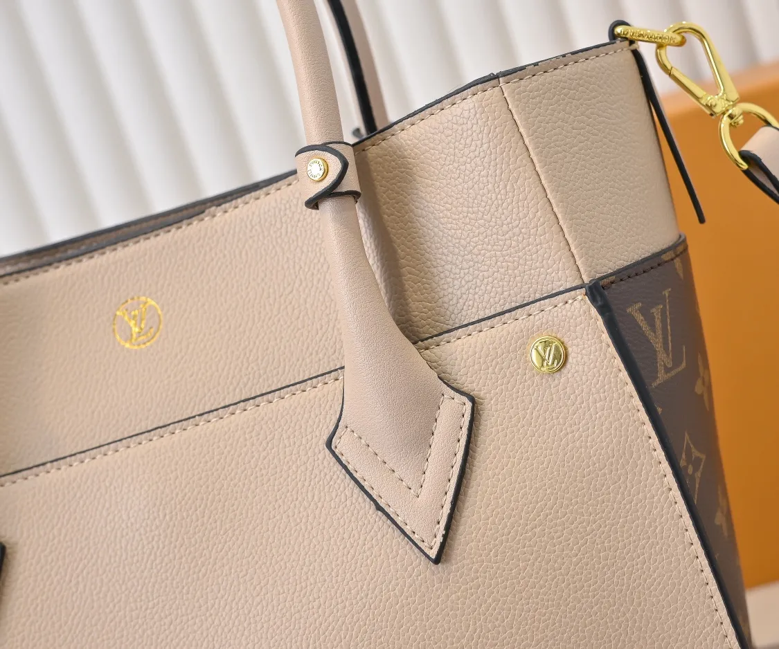 💰360💰Upgraded original [M53826 black embroidery M53825 apricot embroidery M53824 MM53823 presbyopia with black]🔥On My Side handbag shows the elegant fusion of calfskin and classic Monogram canvas. Contrasting canvas shapes the large outer pocket, creating a trompe l'oeil effect as if two handbags merge into one. Plenty of space can easily accommodate office needs, and the adjustable shoulder strap allows for a cross-body style. Dimensions: 30.5 x 24.5 x 14 cm (Length x Height x Width) - Calfskin and Monogram coated canvas - Cowhide leather trim - Microfiber lining - 2 top handles for hand or elbow carry - Adjustable shoulder strap for shoulder or cross-body wear - Lock closure - 2 outer pockets with magnetic closure - Zip pocket - 1 patch pocket