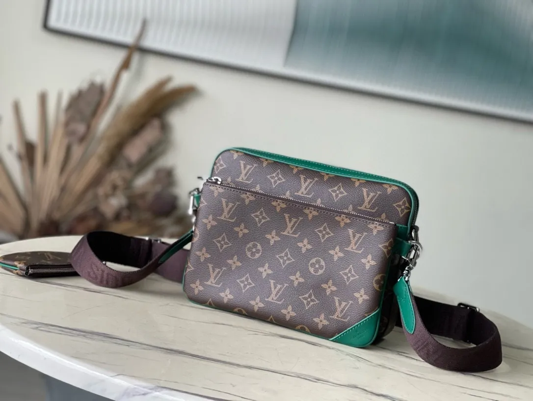 💰800 Top Original Order M12766 This Trio messenger bag is made of Monogram Macassar coated canvas, and then uses bright cow leather to outline the edges and other details. The main compartment and removable zippered front pocket provide storage, and the removable small coin purse secures via the shoulder strap's D-ring. Dimensions: 25 × 18.5 × 7cm