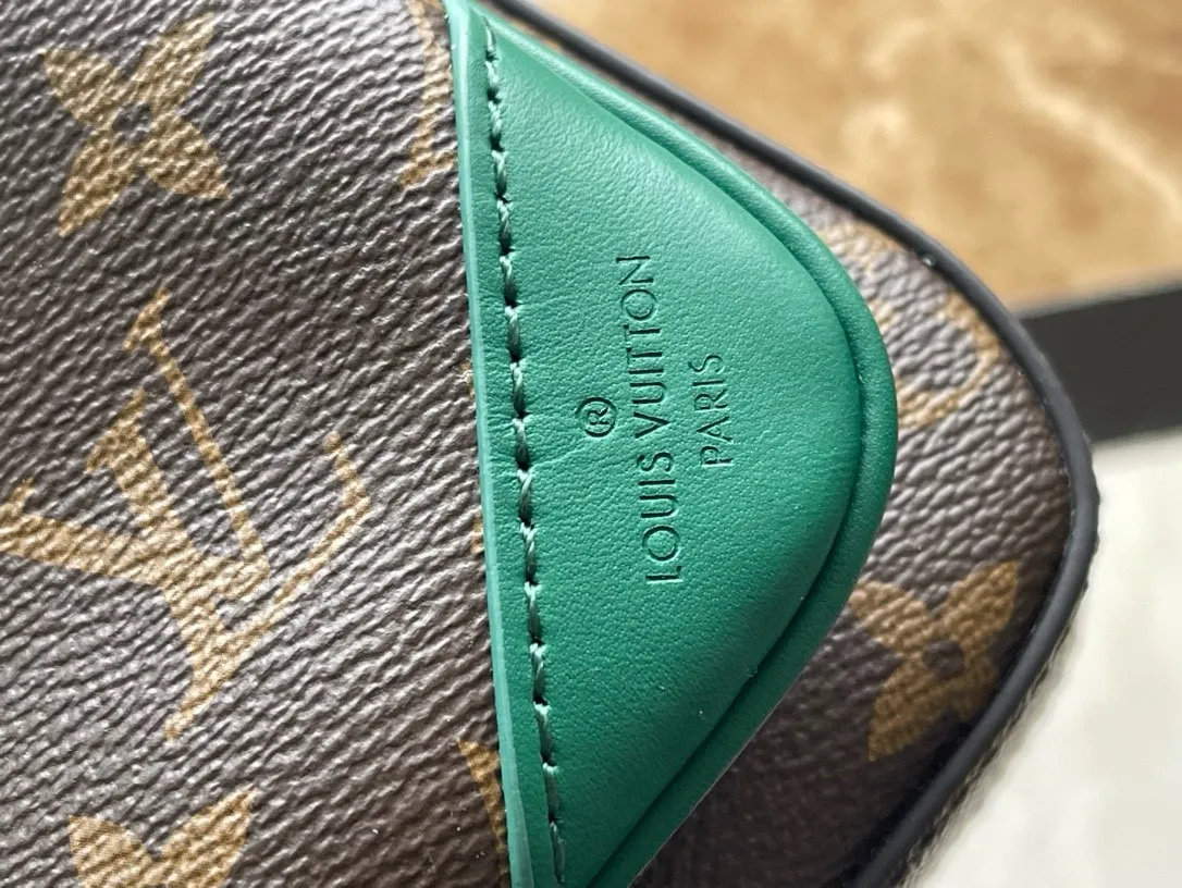 💰800 Top Original Order M12766 This Trio messenger bag is made of Monogram Macassar coated canvas, and then uses bright cow leather to outline the edges and other details. The main compartment and removable zippered front pocket provide storage, and the removable small coin purse secures via the shoulder strap's D-ring. Dimensions: 25 × 18.5 × 7cm