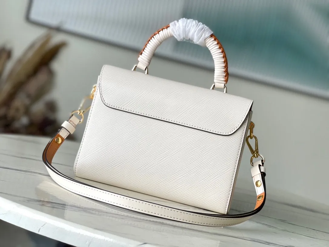 💰1360 (first-grain leather) top-quality original M22236 off-white (woven) This Twist medium handbag is made of Epi embossed leather, and the LV Twist twist lock and top handle are wrapped in woven leather, injecting a feminine touch into the eye-catching structure. With the detachable and adjustable shoulder strap, you can switch between long and short shoulder or cross-body wear. Dimensions: 23.0 x 17.0 x 9.5 cm