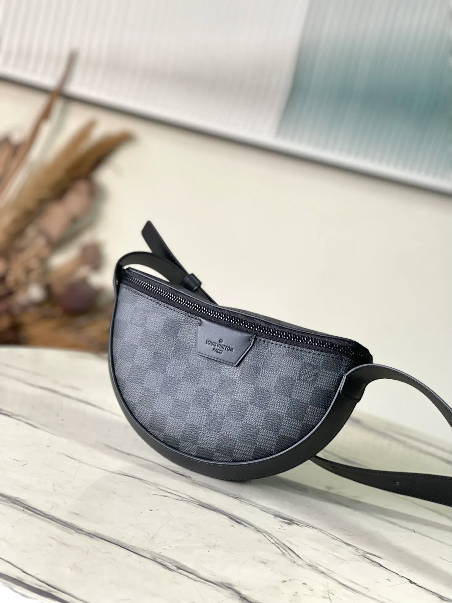 💰780 Top Original Order M23835 Black Check This LV Moon Crossbodfy handbag is made of Monogram Ecipse coated canvas with leather trim and shoulder straps, which is self-evidently elegant. The half-moon wheels allow for cross-body carry, allowing you to easily store your cell phone, small wallet, and headphones. Dimensions: 24.5 × 16 × 4.5 cm