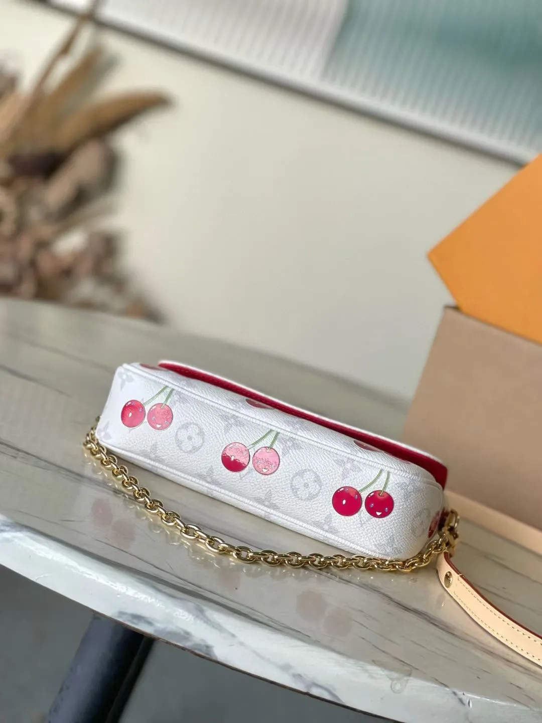 💰760 Top original order M14239 This Wallet On Chain Ivy handbag continues the personality narrative of the 2000s and happily joins the Louis Vuitton × Murakami replica series. Monogram canvas cleverly accentuates the bright colors of the cherry pattern, unleashing the kawaii power in the Japanese artist's mind. Leather strap and chain allow for easy shoulder carry. Dimensions: 23.5 × 12 × 4.3 cm