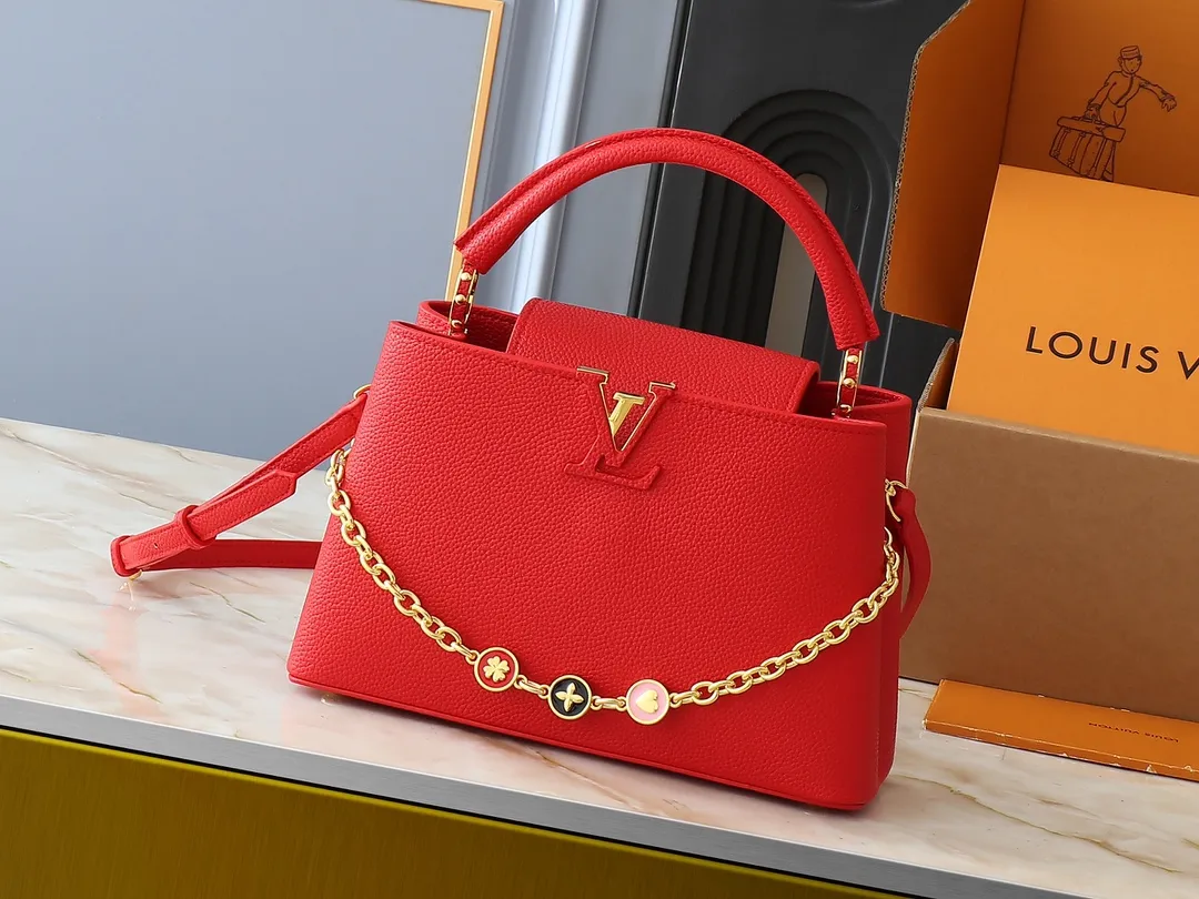 💰420💰Guangzhou goods Upgraded original M00014 M00013 M00015 [New size] This Capucines new size handbag shows soft beauty: Taurillon leather body with light-colored flap and top handle, enamel Monogram flower chain can also achieve a shoulder-carrying experience. Wear the slim leather strap to explore more styling possibilities. Dimensions 31.5 x 20 x 11 cm (length x height x width)