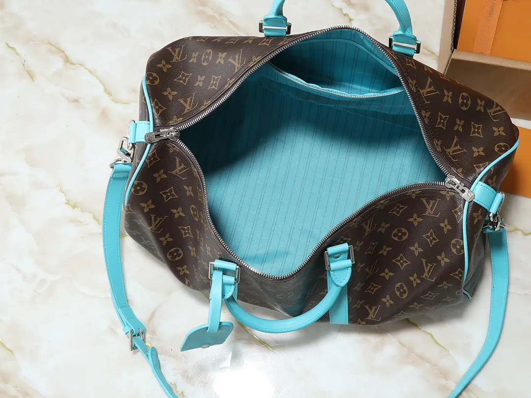 💰320💰Upgraded original M46771 yellow M46775 purple M46772 blue M46769 red M46770 orange M46774 green M46773 rose red This Keepall Bandoulière 50 travel bag is made of Monogram Macassar canvas, which simultaneously renders bright colors for the side straps, nameplate, fabric lining and top leather handle. The size of your carry-on luggage hides plenty of space. 50.0 x 29.0 x 23.0 cm (length x height x width)