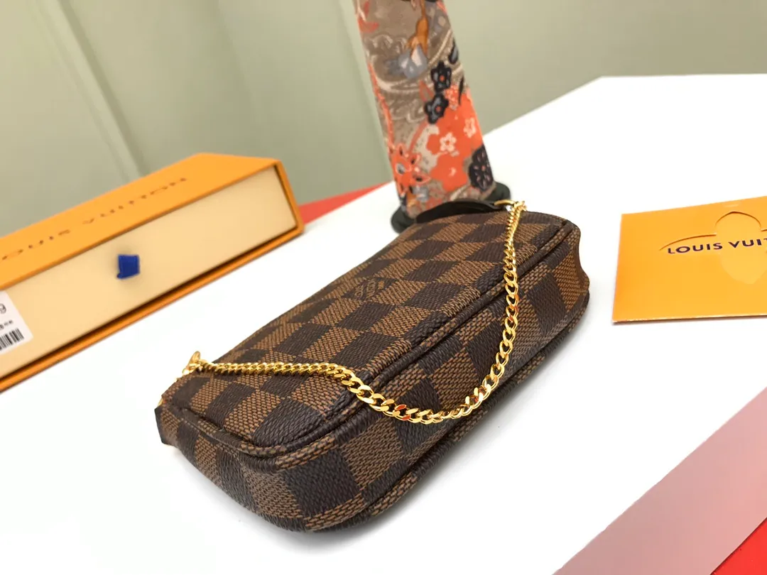 Factory price 240 [Top original order] N58009 Brown 👏👏 This accessory bag opens with a zipper and comes with a gold chain, which can be attached to the D-ring on most Louis Vuitton handbags. Size: 15.5x10.5x4.0cm, packaging: with box