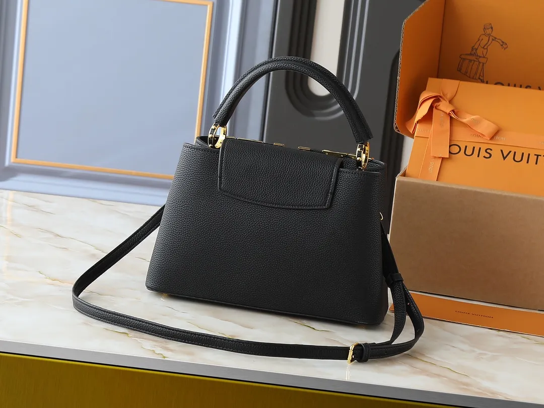💰420💰Guangzhou goods Upgraded original M12135 M11964 M12751 This Capucines medium handbag draws inspiration from the brand’s classic hard suitcase, transforming the iconic Malletage element into a diamond-shaped metal decoration, which complements the Taurillon cow leather bag body. The pocket design makes it easy to store what you need on the go, and the detachable shoulder strap allows for a variety of carrying methods. Dimensions: 31.05 x 20.0 x 11.0 cm (length x height x width)