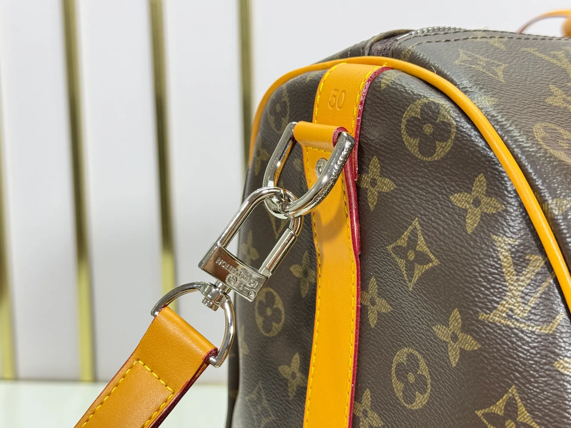 P360 Upgraded Original M41416 M12634 Yellow M12633 Dark Blue M12629 Light Blue M12630 Dark Green Top Original This Keepall Bandoulière 50 travel bag is made of Monogram Macassar canvas, which simultaneously renders bright colors for the side straps, nameplate, fabric lining and top leather handle. The size of your carry-on luggage hides plenty of space. 50.0 x 29.0 x 23.0 cm (L x H x W) • Monogram Macassar coated canvas • Cow leather trim • Textile lining • Metal hardware • Carry-on dimensions • Double zipper closure • Padlock • Removable name tag • Internal zip pocket • Shoulder strap: removable, adjustable • Half-length strap: 36.0 cm • Half-length strap adjustable to: 50.0 cm • Handle: Double handle