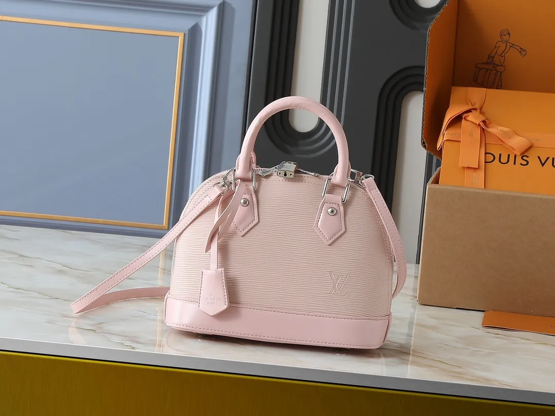💰240💰Upgraded original M41160 M41327 M40855 M40862 M53152 This Alma BB handbag is based on a classic Louis Vuitton bag designed in 1934 with an Art Deco style. In 2010, on the occasion of the 20th anniversary of the official launch of the Alma bag, a mini model was specially designed for the daughter of the woman who owns this bag. The Alma BB bag features a removable shoulder strap for lightweight cross-body wear. A new and stylish take on a classic shape, this bag in Epi leather is available in a range of bright, vibrant colors. Size: 25×19×12cm