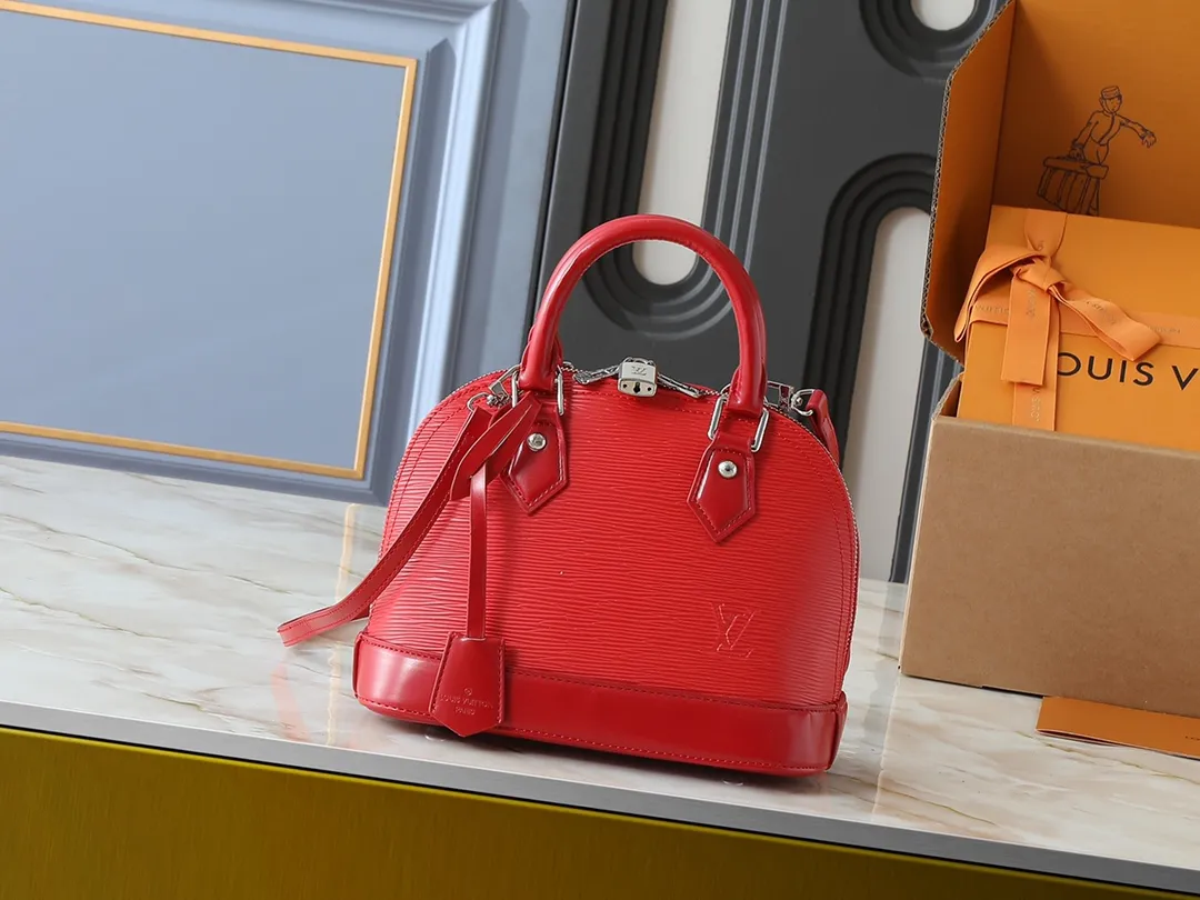 💰240💰Upgraded original M41160 M41327 M40855 M40862 M53152 This Alma BB handbag is based on a classic Louis Vuitton bag designed in 1934 with an Art Deco style. In 2010, on the occasion of the 20th anniversary of the official launch of the Alma bag, a mini model was specially designed for the daughter of the woman who owns this bag. The Alma BB bag features a removable shoulder strap for lightweight cross-body wear. A new and stylish take on a classic shape, this bag in Epi leather is available in a range of bright, vibrant colors. Size: 25×19×12cm