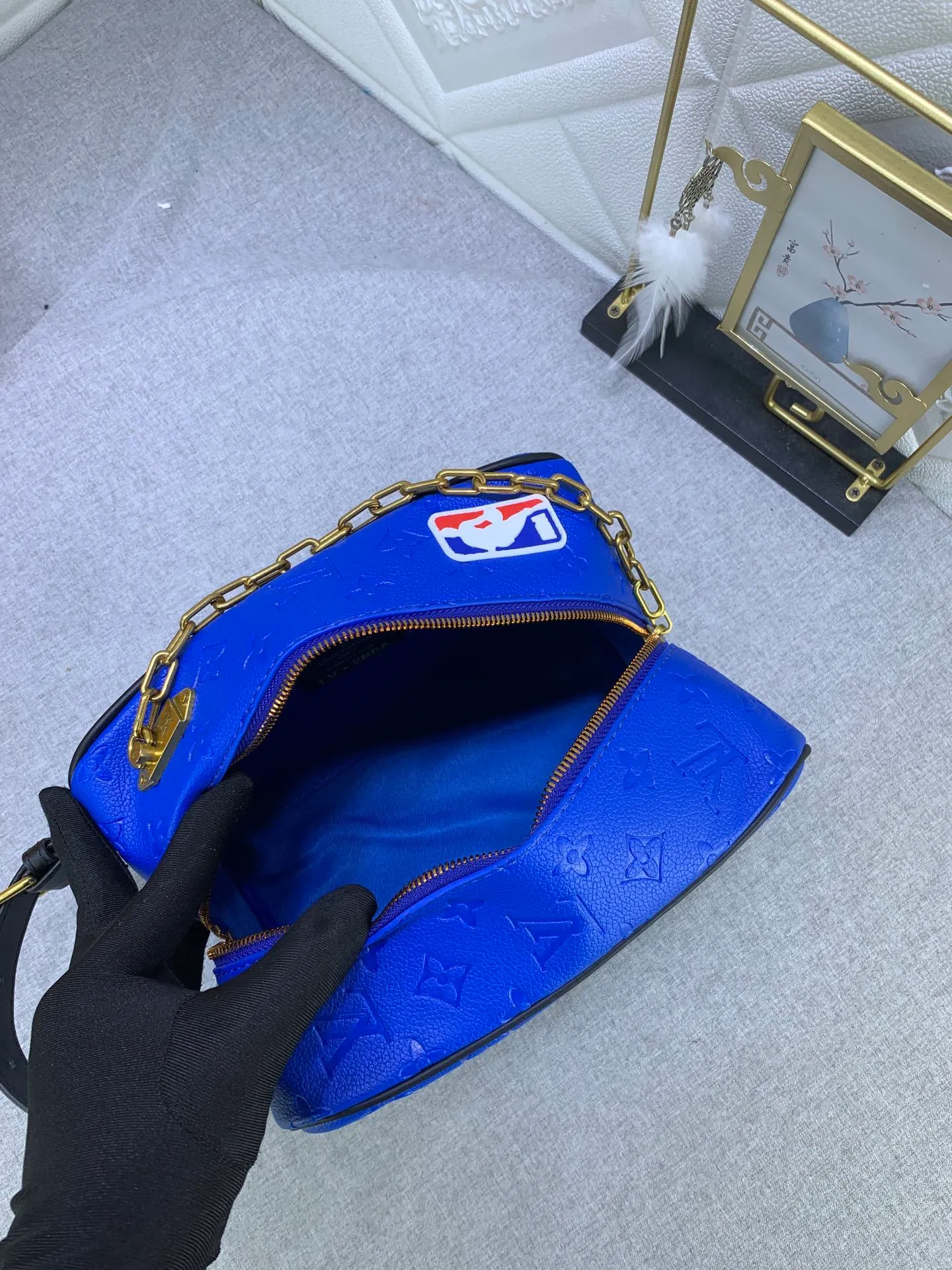 All Categories Official Website "Brand Women's Bags" Women's Bags 💙 LV Dopp Kit Toilet Bag is made of Monogram embossed Taurillon leather, and the full leather embossed NBA Toilet Bag Clutch Box Bag is embellished with a large LV basketball logo and a classic NBA logo patch, witnessing the joint creativity of Louis Vuitton and the NBA.