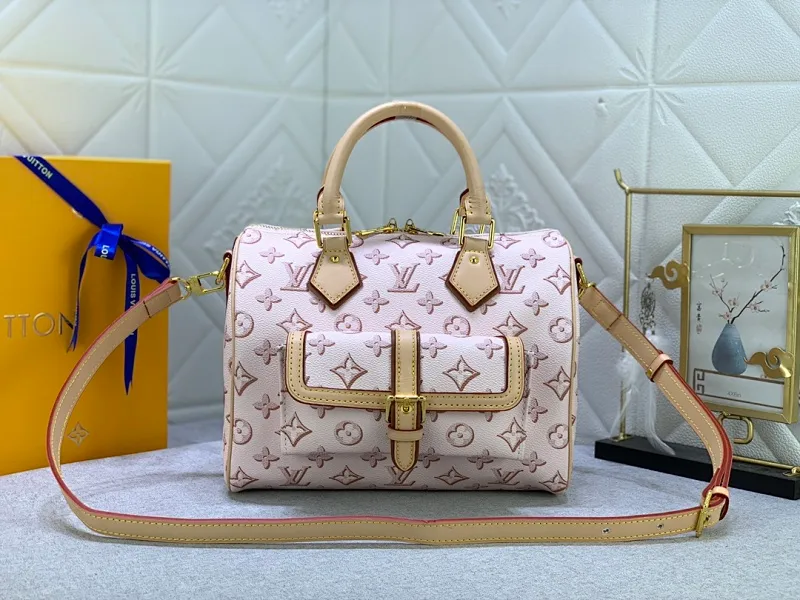 All Categories Official Website "Brand Women's Bags" Women's Bags 💙 LV (new silk screen pillow bag) The compact SPEEDY BANDOULIÈRE 25 handbag reshapes its elegant silhouette, outer pockets and gold buckles. The miniature monogram pattern and leather trim on the canvas evoke the House's historical design codes, as does the rolled leather handle and engraved padlock. an adjustable and