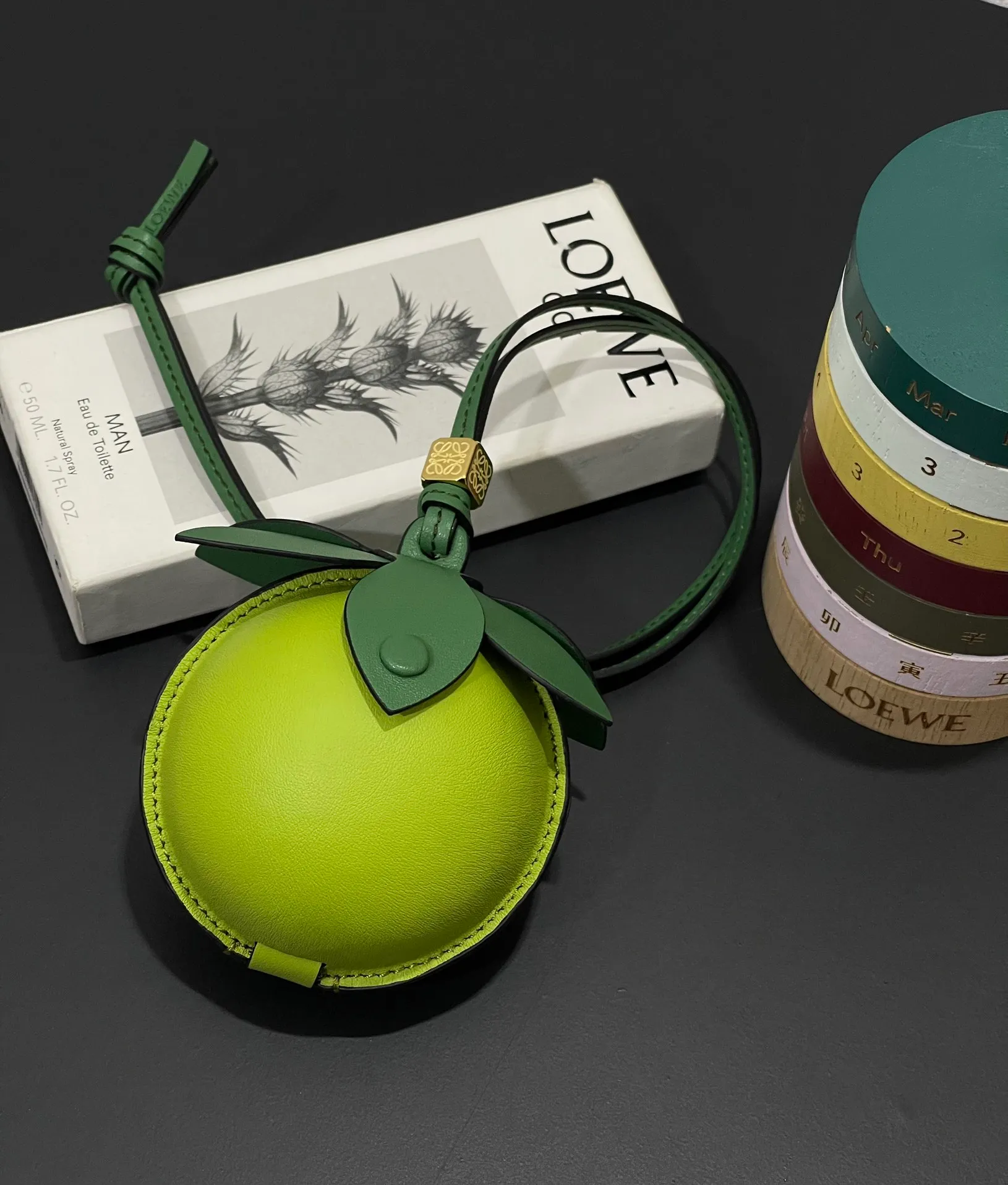 💰880 Big Lime 🍋 Small bag pendant is made of calfskin with contrasting colors and fastened with snap buttons. It can hold some small items and change inside, and can be hung on the neck or bag.    Style No. 327 Size 12*11 (cards cannot be placed)