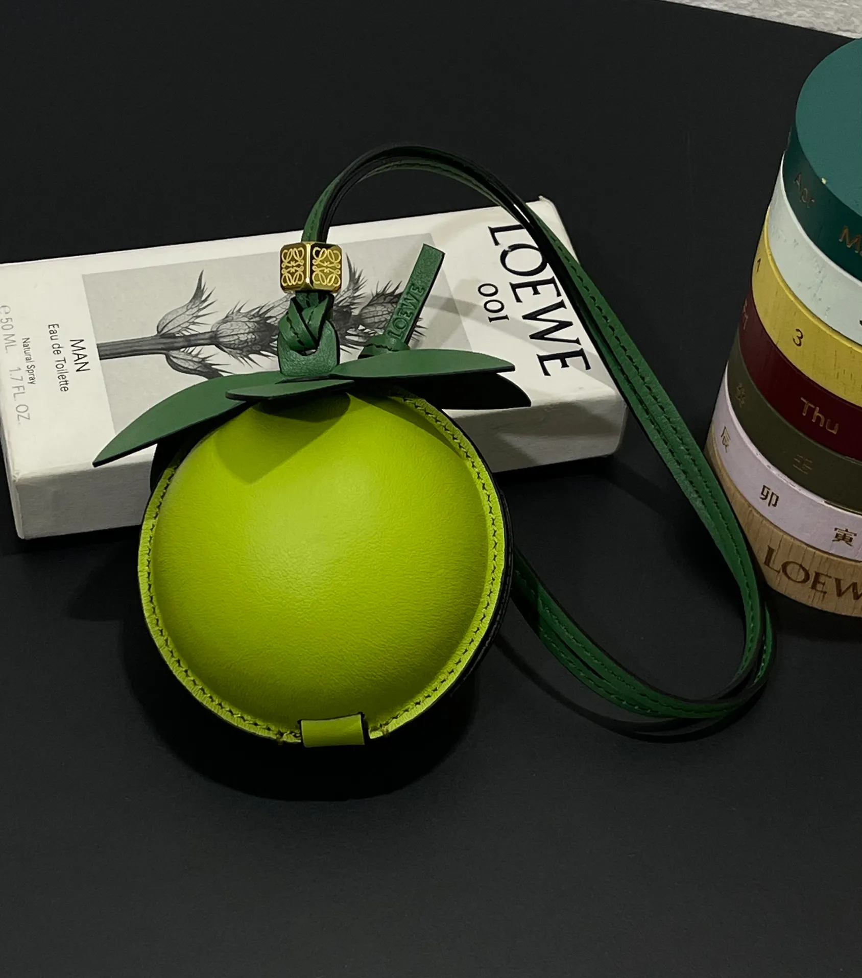 💰880 Big Lime 🍋 Small bag pendant is made of calfskin with contrasting colors and fastened with snap buttons. It can hold some small items and change inside, and can be hung on the neck or bag.    Style No. 327 Size 12*11 (cards cannot be placed)