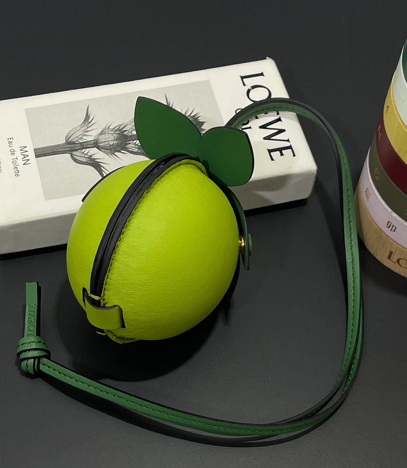 💰880 Big Lime 🍋 Small bag pendant is made of calfskin with contrasting colors and fastened with snap buttons. It can hold some small items and change inside, and can be hung on the neck or bag.    Style No. 327 Size 12*11 (cards cannot be placed)