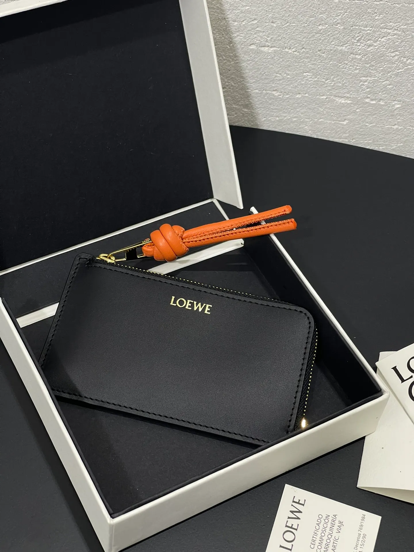 Satin nappa cowhide knot zipper small card holder, sheepskin lining, color-blocked knot pull tab, four card slots and zipper compartment. Style number 3793, size 13.5✕7 💰300