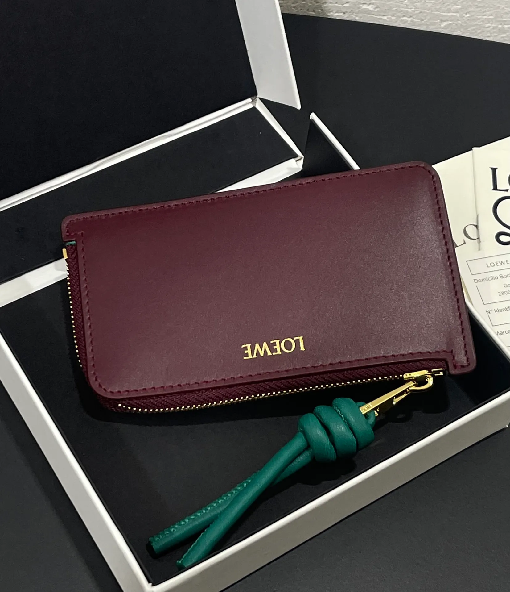 Satin nappa cowhide knot zipper small card holder, sheepskin lining, color-blocked knot pull tab, four card slots and zipper compartment. Style number 3793, size 13.5✕7 💰300