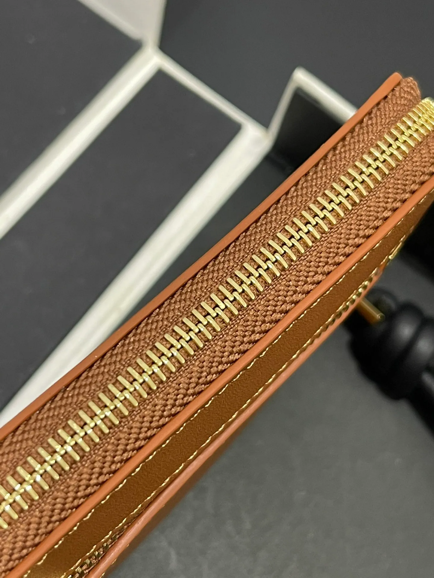 Glossy nappa leather knotted zipper wallet with sheepskin lining, color-blocked knotted pull tab, six card slots and zipper compartment. Style number 3805, size 12*9.5 💰410